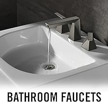 image of a bathroom faucet with water on