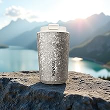 KOYASU Ti-Zen 16oz titanium mug on rock. 1668°C, TiO2 layer, crystalline texture. Pure taste.