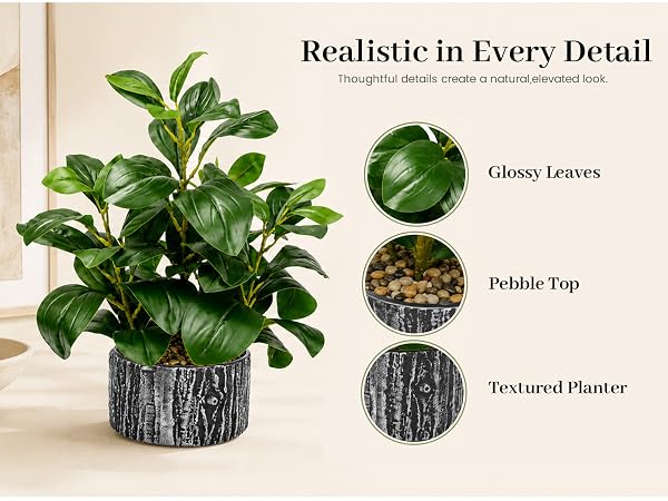 artificial green potted plant glossy leaves pebble textured planter details