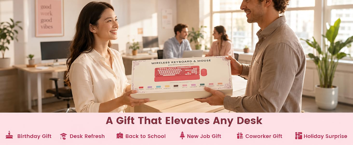 Boxed wireless keyboard and mouse set being given as a desk gift in a bright office scene.