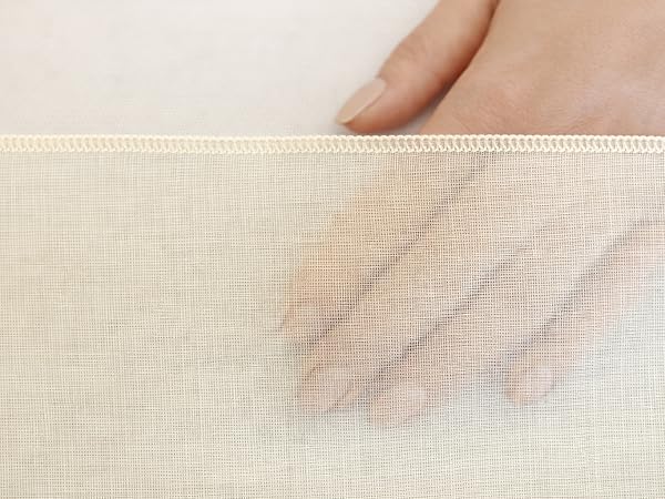 Dense cotton structure allows smooth liquid flow while keeping pulp and particles contained.
