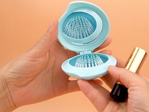 pop out hair brush