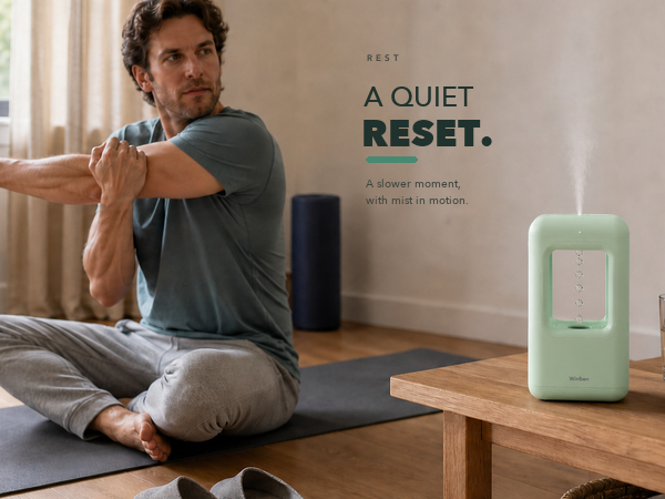 WINBEN green cool mist humidifier running during a daytime stretching and rest routine