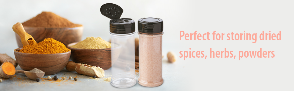 two spice bottle and bowl of spices