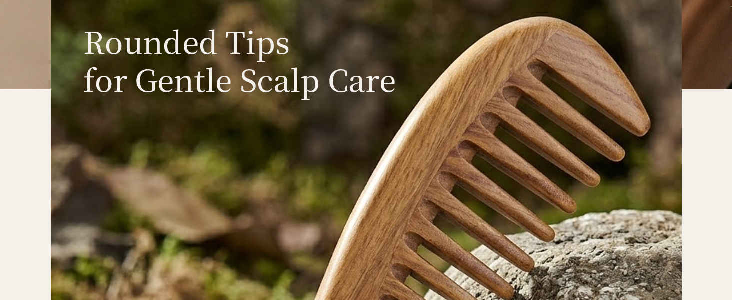 Close-up of a natural wooden wide-tooth comb with smooth rounded teeth.