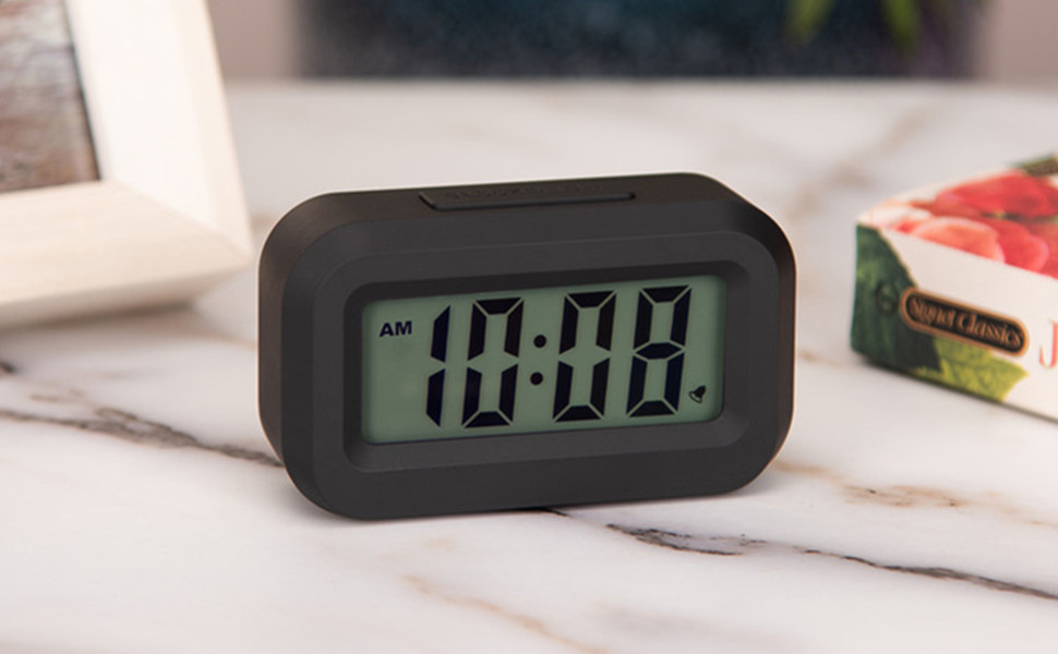 mini alarm clock on the bookside