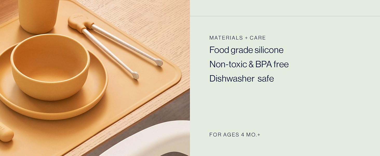 Features non-toxic plastic, sustainably sourced wood, and a machine washable cushion.