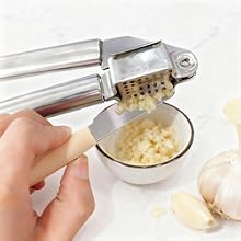 Use a small spatula to transfer the excess minced garlic to a bowl.