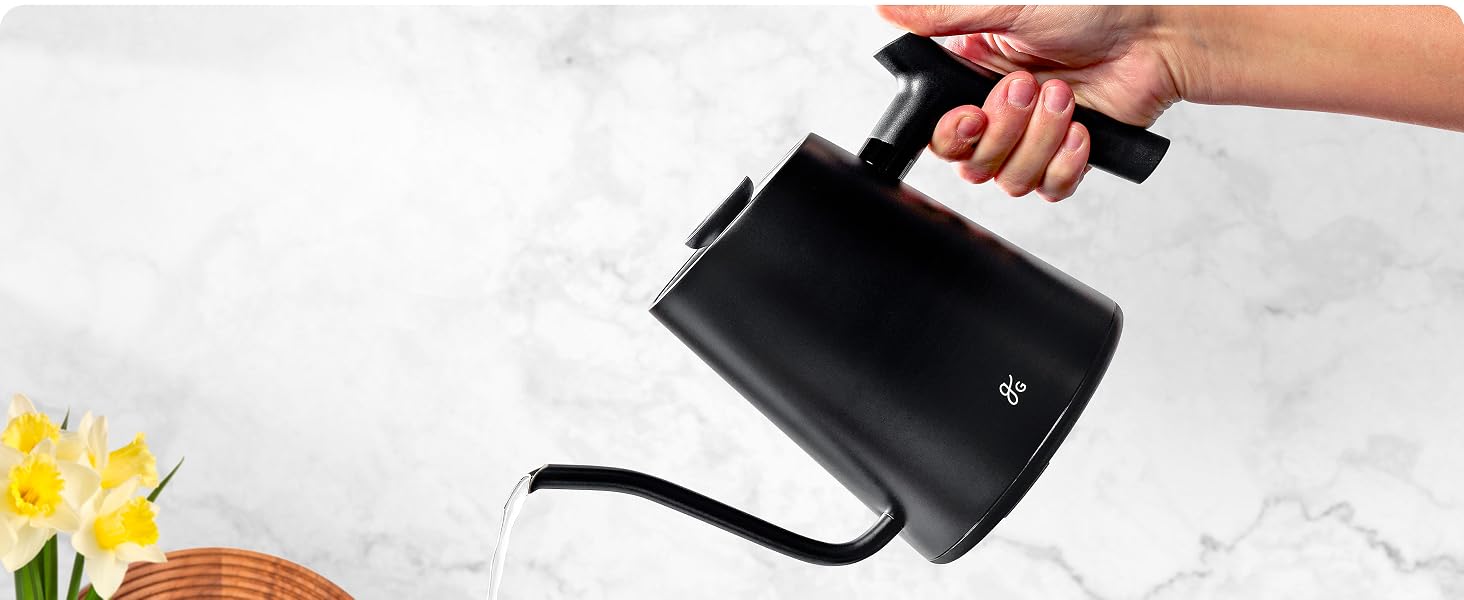 hand tipping the greater goods gooseneck kettle pouring water