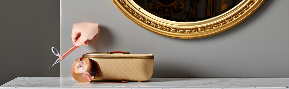 A sleek rose gold ear wax removal kit displayed on a marble surface.
