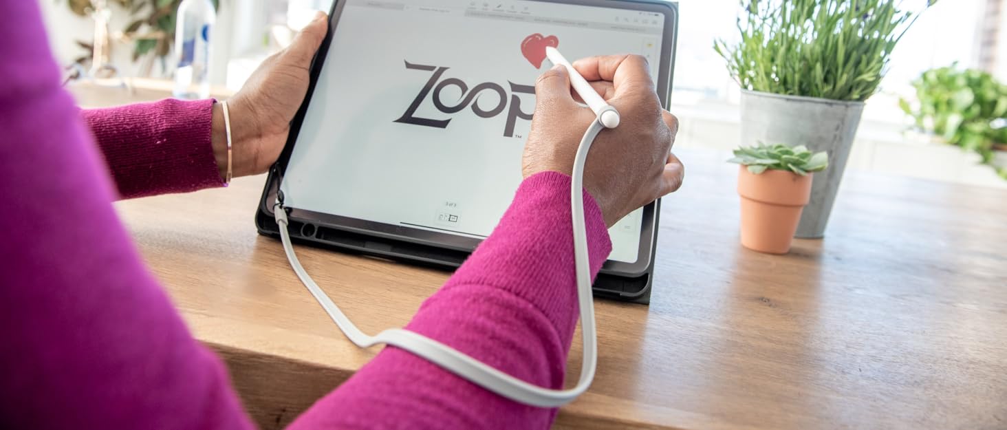 Background image ZoopLoop and iPad on table with flowers