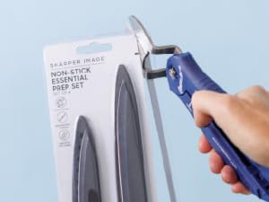 Open It Tool cutting through tough plastic packaging