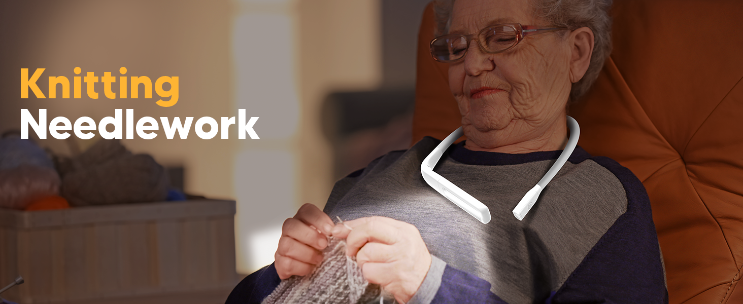 A old woman is knitting or crocheting with a neck light on for handsfrees convenient illumination