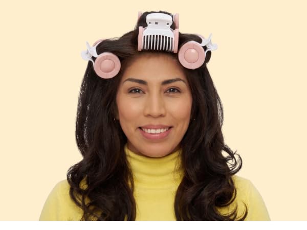 Woman with curlers in hair
