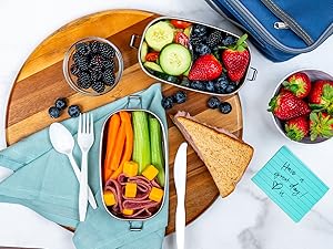 Packed lunch with cutlery on the side.