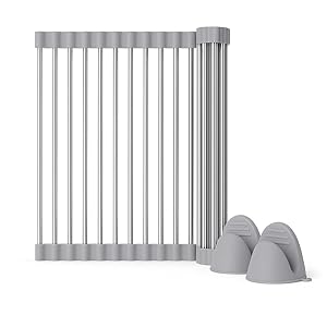 Gray roll-up kitchen mat with silicone gloves on white background