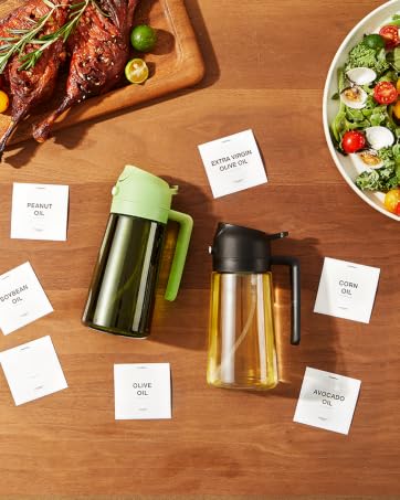 Tabletop scene with food containers, salad bowl, cutting board with meat, and labeled cards for meal planning or recipe organization.