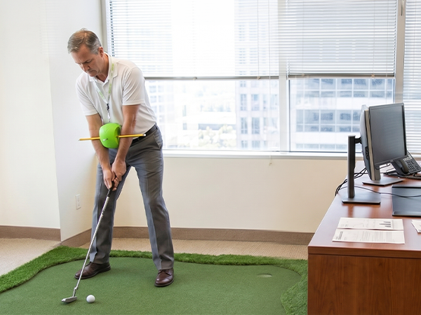 golf swing training at office