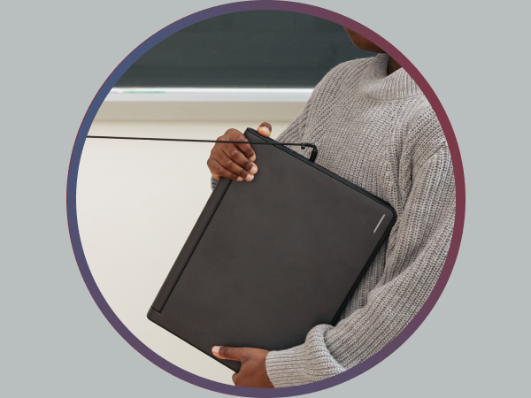 Two children testing the reinforced connection durability of Cyber Acoustics headsets