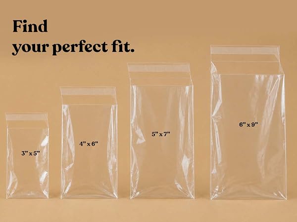 Four empty clear self-seal cello bags in 3x5, 4x6, 5x7, and 6x9 inch sizes