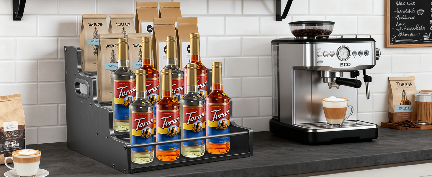 Coffee syrup bottle organizer for home cafe, tiered stand for Torani syrups and accessories.