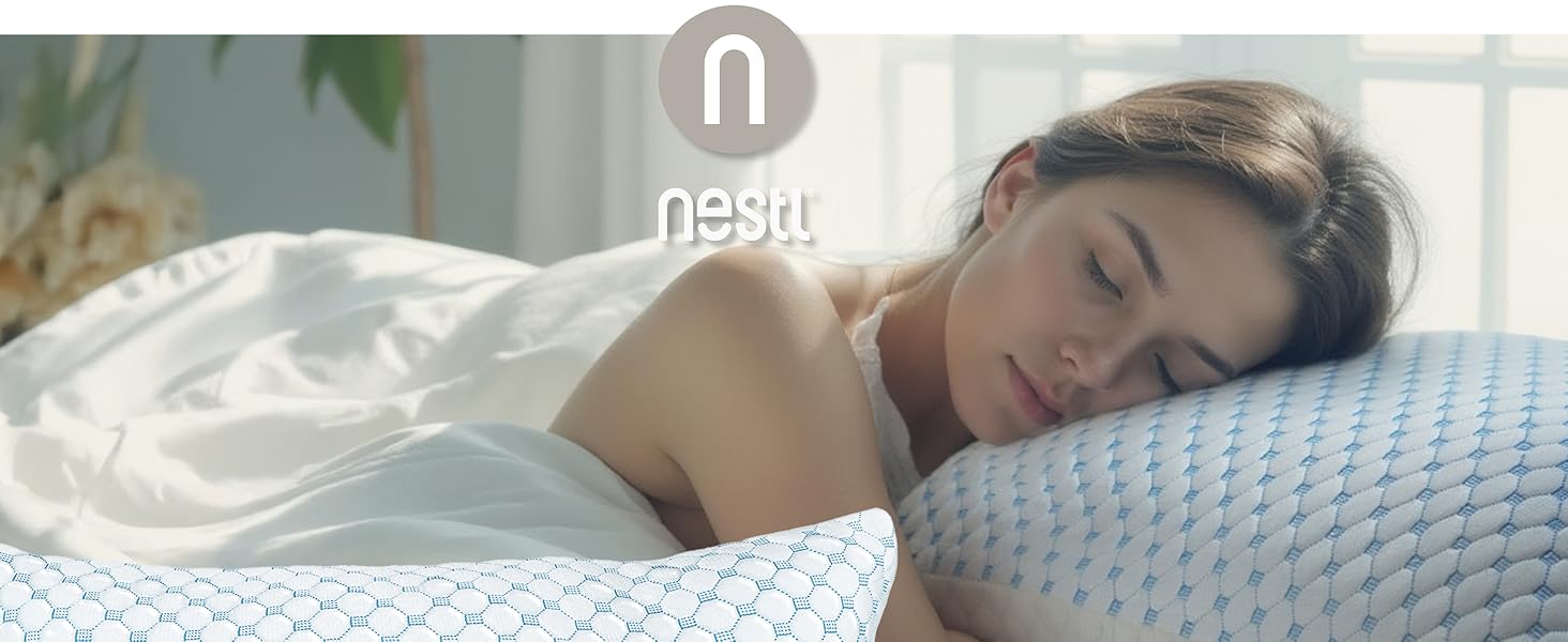 Woman sleeping on Nestl cooling pillow