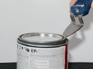Open It Tool opening a can of paint