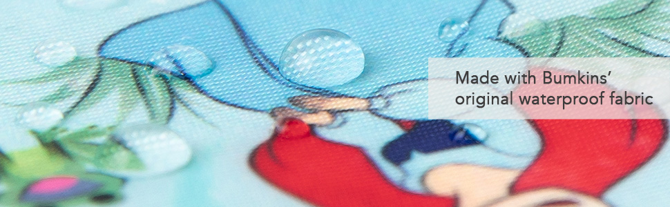 Close-up of beaded water droplets on fabric featuring Ariel