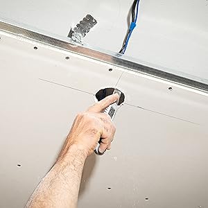 cutting a hole in the ceiling