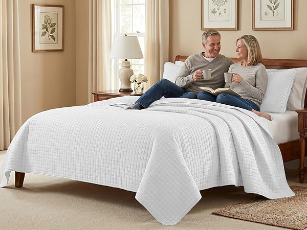 California king quilt in neutral tone with lightweight comfort and stitched detail