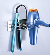 Wall-mounted holder containing blue and orange handled tools or brushes against light background.