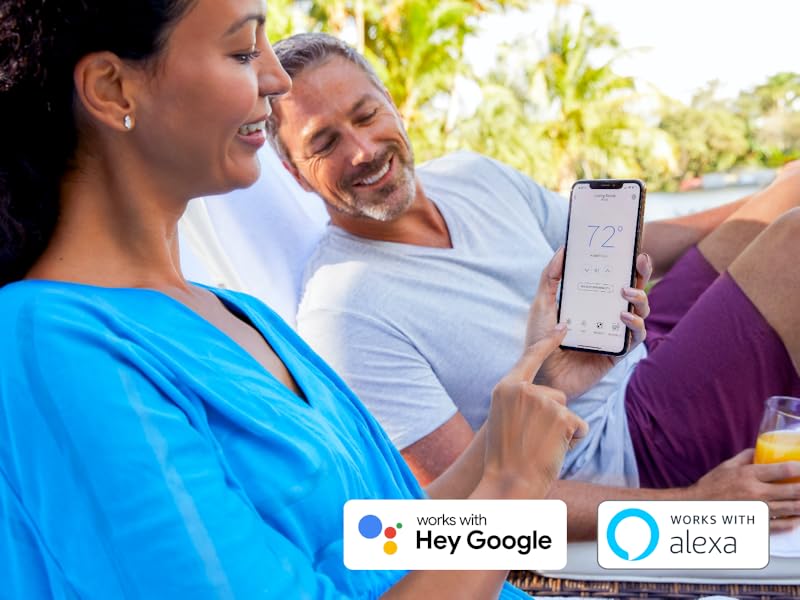Couple on vacation using the Honeywell Home app to control their Wifi Smart Color Thermostat