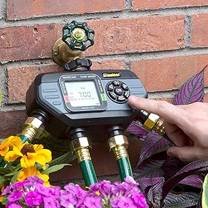 Remote controlled Melnor Automatic Watering Timer connected to four hoses