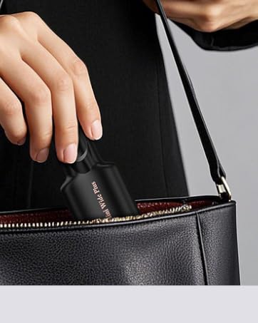 Compact black handheld device shown in size comparison, with demonstration of its portability next to a purse.