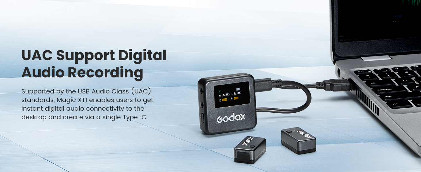Digital audio recording device with small screen connected to laptop, featuring UAC support for digital audio recording functionality.