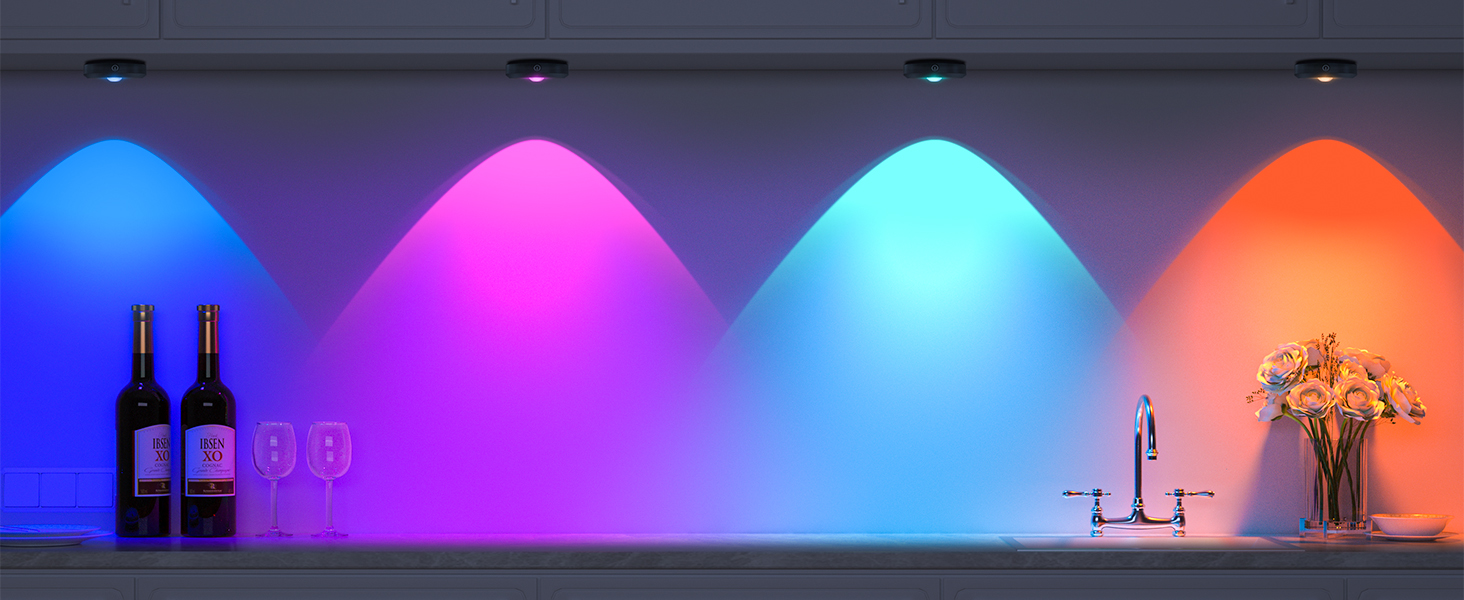 Bar shelf with colored LED accent lighting creating blue, pink, cyan, and orange illuminated zones, displaying wine bottles and glassware.