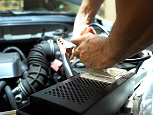 Car battery tester does 6V/12V load testing, charging system diagnosis, and starter motor testing.