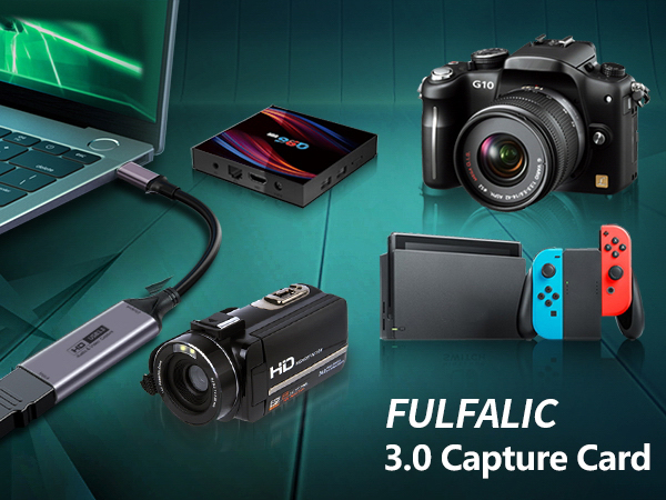 Text reads: 'FULIALIC 3.0 Capture Card'. Product image showing camera, Nintendo Switch, video camera, and capture card device on green surface.