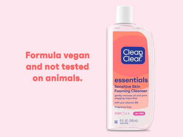 Clean & Clear Essentials Foaming Cleanser on pink background, formula vegan, not tested on animals