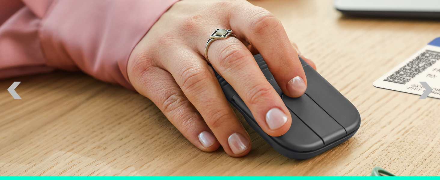a person holding a foldable mouse