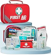 Red first aid kit with white cross symbol, displayed alongside various medical supplies including bandages, gloves, and antiseptic wipes on a blue platform.