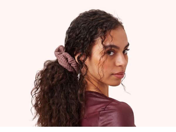 Curly hair in scrunchie