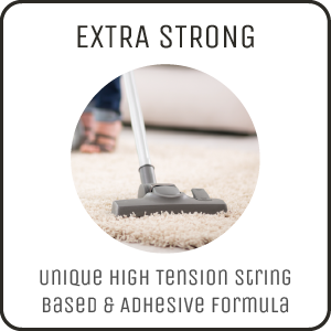 Vacuum being used on white carpet; text reads, “Extra strong” in capital black letters.