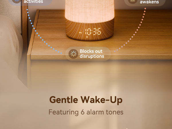 Text reads 'Gentle Wake-Up' and 'Featuring 6 alarm tones'. Display shows digital clock interface with warm orange illumination.