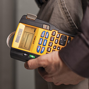 DYMO Rhino 5200 handheld with label printed at the top of machine