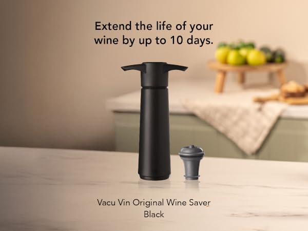 Manual wine vacuum pump with ergonomic grip and reusable wine stoppers to prevent oxidation