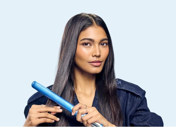 Woman with straightener