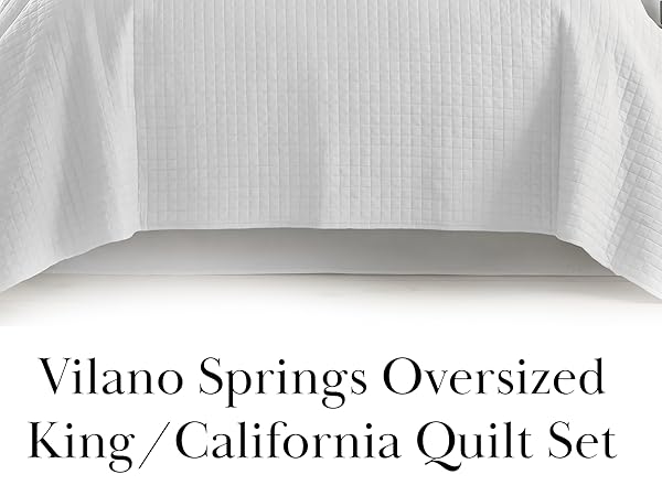 California king quilt in white with lightweight comfort and oversized side drape