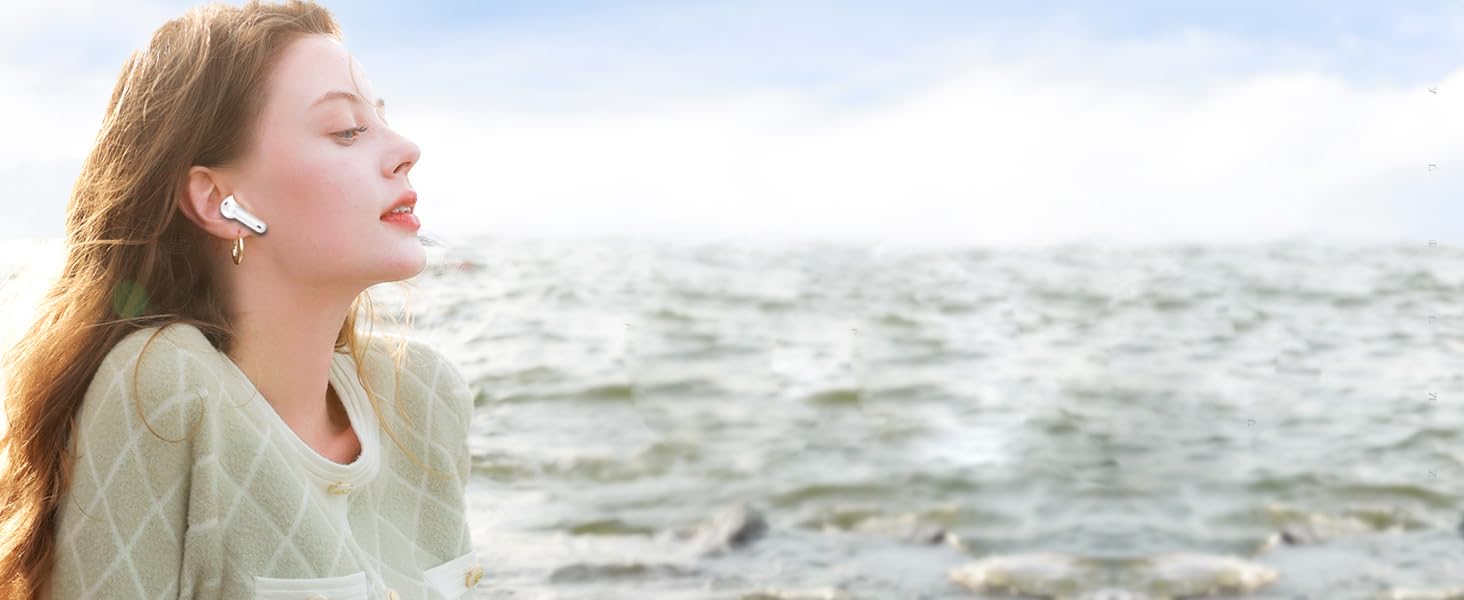 Person with windswept hair on a beach, series of shots showing joyful expressions against ocean backdrop.