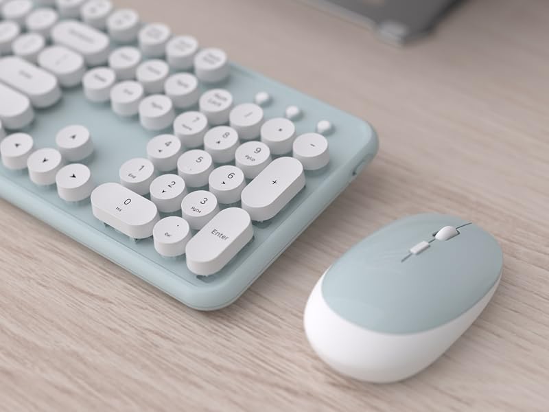 green white wireless keyboard and mouse